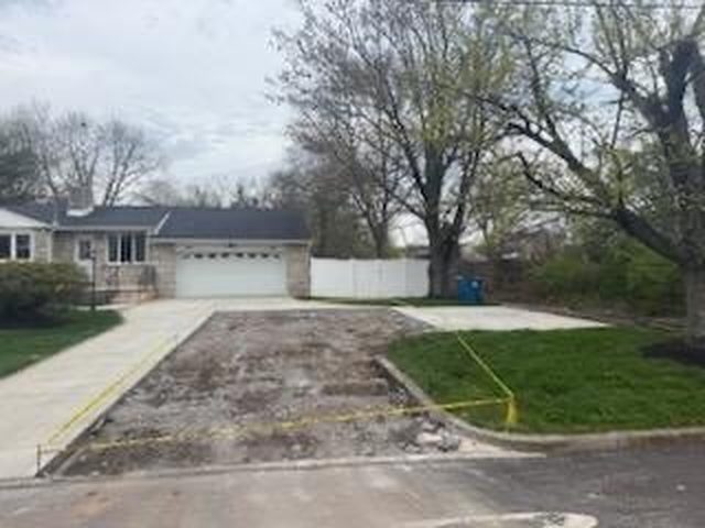 Freshly finished concrete driveway slab