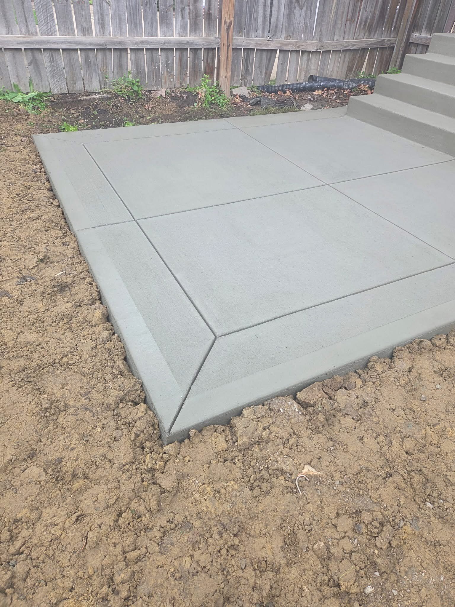 New concrete patio with a beveled perimeter edge
