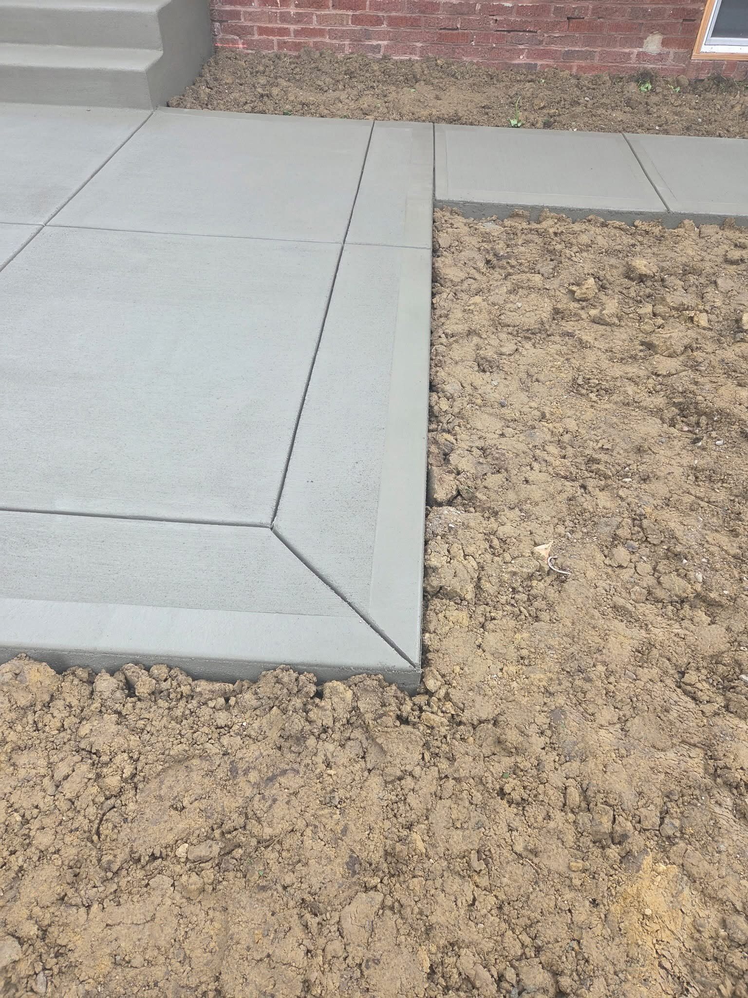 Close view of a finished concrete patio corner