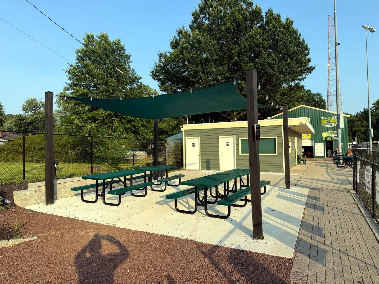 Commercial concrete pad for a shaded outdoor seating area