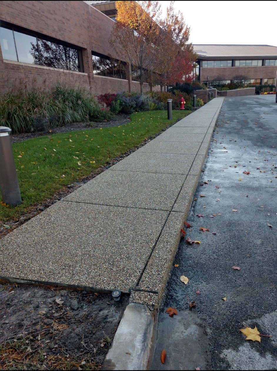 Exposed aggregate concrete walkway at a commercial property