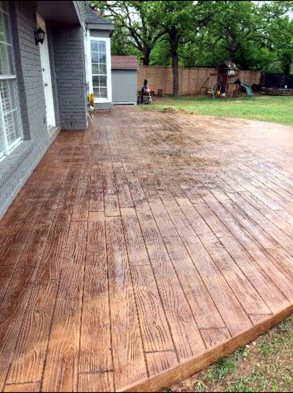 Stamped concrete patio with a wood plank finish